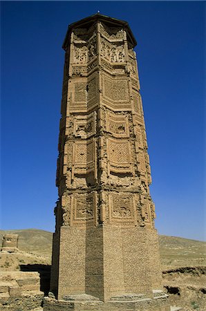 The minaret of Sultan Mas'ud III, one of two minarets built by Sultan Mas'ud III and Bahram Shah with square Kufic and Noshki script, that served as models for the minaret of Jam, and believed to have originally been part of mosques, Ghazni, Afghanistan, Asia Stock Photo - Rights-Managed, Code: 841-02916633