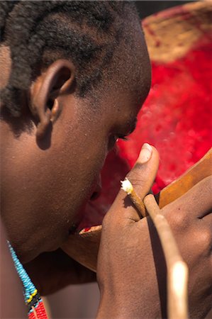 simsearch:841-02917043,k - Hamer man drinking cows blood for breakfast, Dombo village, Turmi, Lower Omo valley, Ethiopia, Africa Stock Photo - Rights-Managed, Code: 841-02916991