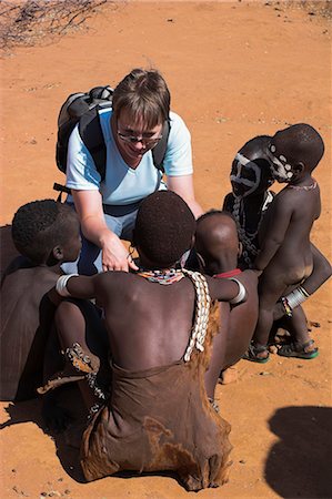 simsearch:841-02920040,k - Tourist with Hamer (Hamar) children, Dombo village, Lower Omo Valley, Ethiopia, Africa Stock Photo - Rights-Managed, Code: 841-02917050