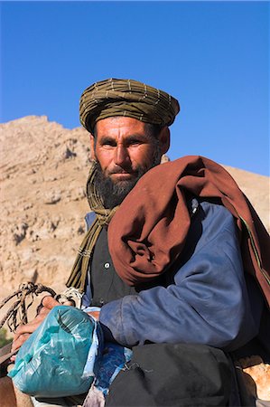 Aimaq man on horse, Pal-Kotal-i-Guk, between Chakhcharan and Jam, Afghanistan, Asia Stock Photo - Rights-Managed, Code: 841-02917112