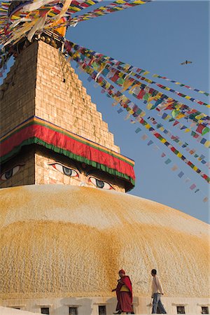 Monk and man walking around the stupa during Lhosar (Tibetan and Sherpa New Year festival), Bodhnath Stupa, UNESCO World Heritage Site, Bagmati, Kathmandu, Nepal, Asia Stock Photo - Rights-Managed, Code: 841-02917298