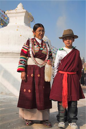simsearch:841-02917363,k - Tibetan mother and son in traditional clothes at Lhosar (Tibetan and Sherpa New Year) festival, Bodhnath stupa, UNESCO World Heritage Site, Bagmati, Kathmandu, Nepal, Asia Stock Photo - Rights-Managed, Code: 841-02917393