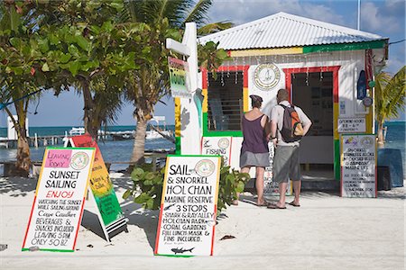 Raggamuffin Tours office on beach, Caye Caulker, Belize, Central America Stock Photo - Rights-Managed, Code: 841-02917506