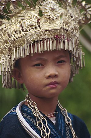 Portrait of a Miao girl wearing silver, festival, Langde, Guizhou, China, Asia Stock Photo - Rights-Managed, Code: 841-02917639