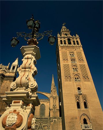 Decorative lamps and the Giralda tower in the city of Seville, Andalucia, Spain, Europe Stock Photo - Rights-Managed, Code: 841-02917791