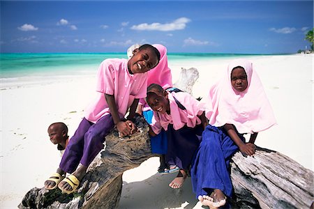 Young Muslim children in school uniform on beach at Jambiani, Zanzibar, Tanzania, Africa Stock Photo - Rights-Managed, Code: 841-02918031