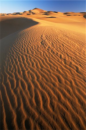 desert ripples scenes - Sand dunes in Erg Chebbi sand sea, Sahara Desert, near Merzouga, Morocco, North Africa, Africa Stock Photo - Rights-Managed, Code: 841-02918059