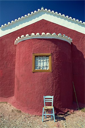 Blue painted chair outside traditional painted church, Spetse, Greek Islands, Greece, Europe Stock Photo - Rights-Managed, Code: 841-02918162