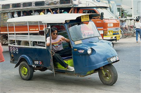 Driver of local transport vehicle on the road in Ayutthaya, Thailand, Southeast Asia, Asia Stock Photo - Rights-Managed, Code: 841-02918529