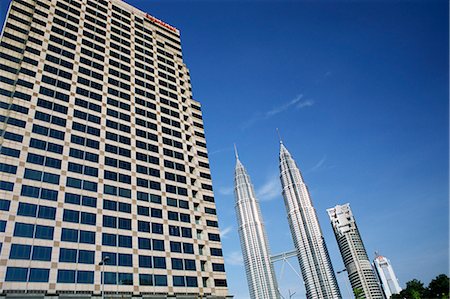 petronas twin towers - Petronas twin towers et business building sur la gauche, Kuala Lumpur, en Malaisie, l'Asie du sud-est, Asie Photographie de stock - Rights-Managed, Code: 841-02918566