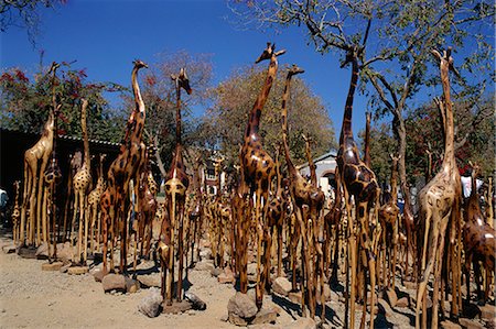 Giraffe carvings for sale, Victoria Falls town, Zimbabwe, Africa Foto de stock - Con derechos protegidos, Código: 841-02918650