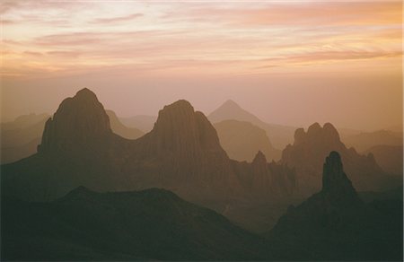 Sahara Desert, Hoggar Mountains, sunrise over Assekrem, Algeria, North Africa Stock Photo - Rights-Managed, Code: 841-02918823