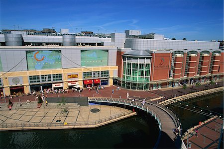 shopping malls in england - Eastern end of the Oracle shopping complex with curved footbridge over River Kennet and Debenham's store, Reading, Berkshire, England, United Kingdom, Europe Stock Photo - Rights-Managed, Code: 841-02918903