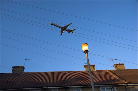 simsearch:841-02992776,k - Aeroplane above houses, Hounslow, Greater London, England, United Kingdom, Europe Stock Photo - Rights-Managed, Code: 841-02919231