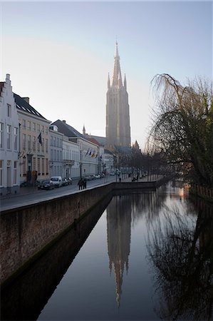 Looking south west along Dijver, towards The Church of Our Lady (Onze Lieve Vrouwekerk), Bruges, Belgium, Europe Stock Photo - Rights-Managed, Code: 841-02919787