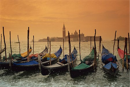 View past docked gondolas towards St. Mark's Square, from across the Grand Canal, Venice, UNESCO World Heritage Site, Veneto, Italy, Europe Stock Photo - Rights-Managed, Code: 841-02919967