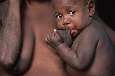 Mother breast-feeding, Tanna Island, Vanuatu, Pacific Islands, Pacific Foto de stock - Con derechos protegidos, Código: 841-02924074