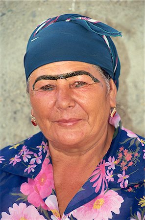 facial decoration - Woman with joined eyebrows, main food market, Samarkand, Uzbekistan, Central Asia, Asia Stock Photo - Rights-Managed, Code: 841-02924216