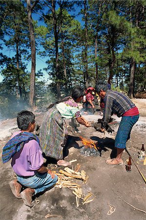 simsearch:841-03676104,k - Man and woman sacrificing a chicken over a fire during pagan worship at Pascual Abaj, Chichicastenango, Guatemala, Central America Stock Photo - Rights-Managed, Code: 841-02924429