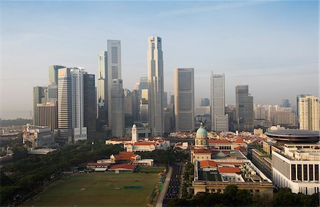 singapore skyline - Singapore skyline with the Padang and Colonial District in the foreground, Singapore, South East Asia Stock Photo - Rights-Managed, Code: 841-02924605