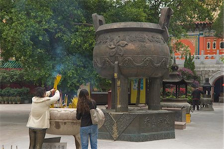 pious - Worshippers at the Po Lin Monastery, Lantau Island, Hong Kong, China, Asia Stock Photo - Rights-Managed, Code: 841-02924941