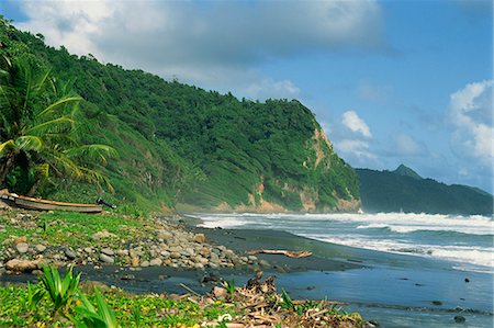 dominica - Rugged coastline with black laval sand beach, Dominica, Windward Islands, West Indies, Caribbean, Central America Stock Photo - Rights-Managed, Code: 841-02925539