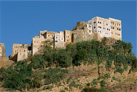 Fortress houses on hilltop, typical architecture of the area, Mahwit, Sana'a region, north Yemen, Middle East Stock Photo - Rights-Managed, Code: 841-02920302