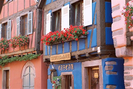 Exterior of blue house with windowboxes of geraniums, Niedermorschwihr, Haute-Rhin, Alsace, France, Europe Stock Photo - Rights-Managed, Code: 841-02920564