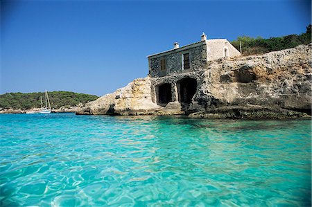 simsearch:841-03030230,k - Stone dwelling overlooking bay, Cala Mondrago, Majorca, Balearic Islands, Spain, Mediterranean, Europe Stock Photo - Rights-Managed, Code: 841-02920911