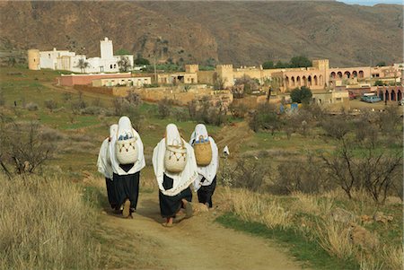 Berber women going to market, Tafraoute region, Morocco, North Africa, Africa Fotografie stock - Rights-Managed, Codice: 841-02923860