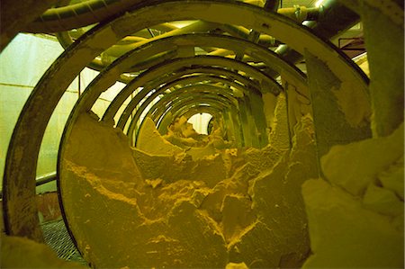 saskatchewan - Yellow cake, powdery uranium oxide in Burwell filter press, Uranium City, Saskatchewan, Canada, North America Fotografie stock - Rights-Managed, Codice: 841-02923980