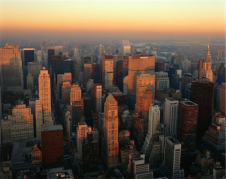 dawn manhattan - The Manhattan skyline at dusk, including the Chrysler Building, viewed from the Empire State Building, New York City, United States of America, North America Stock Photo - Rights-Managed, Code: 841-02944354