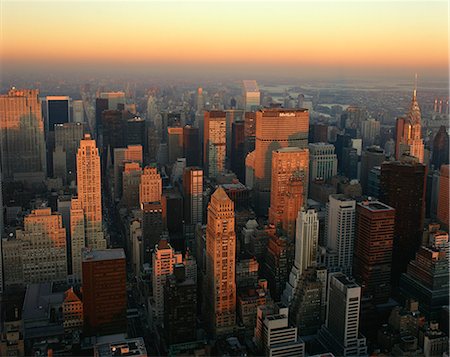 The Manhattan skyline at dusk, including the Chrysler Building, viewed from the Empire State Building, New York City, United States of America, North America Stock Photo - Rights-Managed, Code: 841-02944354