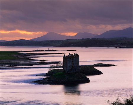 Castle Stalker on Loch Linnhe, silhouetted at dusk, Argyll, Scotland, United Kingdom, Europe Stock Photo - Rights-Managed, Code: 841-02944383