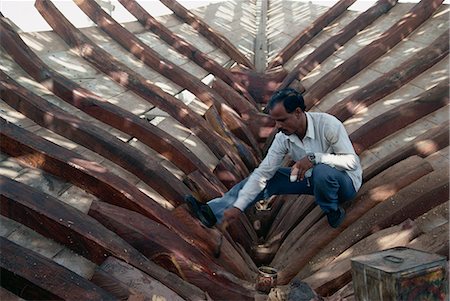 dhow boat - Dhow construction, Manama, Bahrain, Middle East Stock Photo - Rights-Managed, Code: 841-02944739