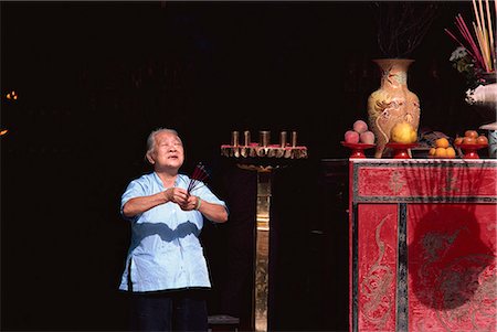 elderly praying - Chinese temple, Thian Hok Keng, Chinatown, Singapore, Southeast Asia, Asia Stock Photo - Rights-Managed, Code: 841-02944908