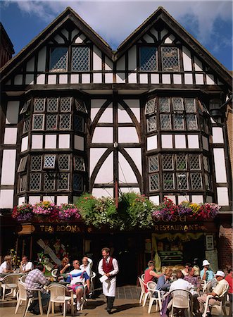Outdoor tea room and tudor building facade, Winchester, Hampshire, England, United Kingdom, Europe Fotografie stock - Rights-Managed, Codice: 841-02945405