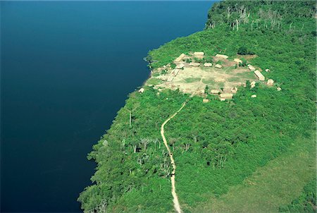 simsearch:841-03676089,k - Aerial of a Xingu village and path beside a river in Brazil, South America Fotografie stock - Rights-Managed, Codice: 841-02945417