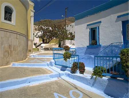 simsearch:841-03030577,k - Steps in village street passing blue and white painted house on Kalimnos, Dodecanese Islands, Greek Islands, Greece, Europe Stock Photo - Rights-Managed, Code: 841-02945663