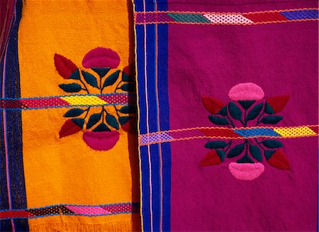 Brightly coloured craft rugs on display at San Cristobal de las Casas, in Chiapas, Mexico, North America Stock Photo - Rights-Managed, Code: 841-02945783