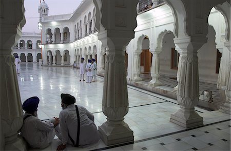 Two Sikhs priests at dawn sitting under arcades, Golden Temple, Amritsar, Punjab state, India, Asia Stock Photo - Rights-Managed, Code: 841-02945831