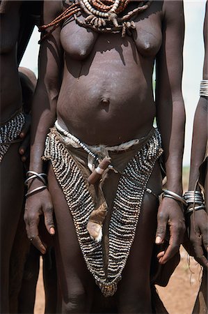 Chainmail skirts worn by Bume tribeswomen, Murulle, Ethiopia, Africa Stock Photo - Rights-Managed, Code: 841-02946027