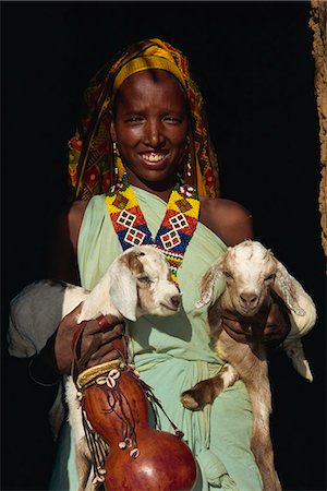 simsearch:841-02920266,k - Woman holding twin kid goats and gourd, and wearing beads, Harar, Ethiopia, Africa Stock Photo - Rights-Managed, Code: 841-02946122