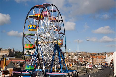 simsearch:841-06345053,k - Big ferris wheel in Luna Park Amusements funfair by harbour, Scarborough, North Yorkshire, Yorkshire, England, United Kingdom, Europe Stock Photo - Rights-Managed, Code: 841-02946265