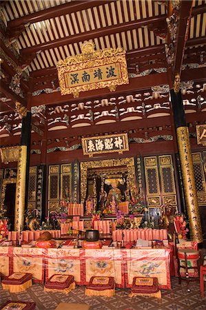 Altar in main prayer hall of Taoist temple, with Ma Po Cho sea goddess statue, Thian Hock Keng Temple of Heavenly Happiness built in 1842, dedicated to Matsu Sea Goddess, oldest Chinese temple in the city, Hokkien community, Chinatown, Outram, Singapore, Southeast Asia, Asia Stock Photo - Rights-Managed, Code: 841-02946324