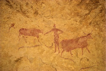 Painting with herdsman tending cattle on cave wall, Tassili Plateau, Algeria, North Africa, Africa Foto de stock - Con derechos protegidos, Código: 841-02946646