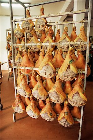 Parma hams on curing racks, near Pavullo, Emilia-Romagna, Italy, Europe Stock Photo - Rights-Managed, Code: 841-02946679