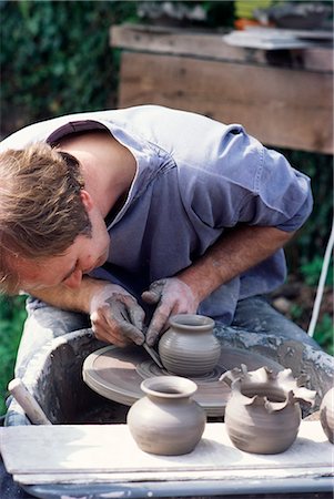 Potter at work on wheel at Rustic Fayre, Devon, England, United Kingdom, Europe Stock Photo - Rights-Managed, Code: 841-02946680