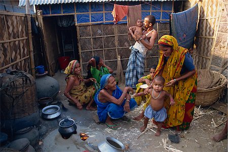 simsearch:841-02947142,k - Families in the area outside their shack in a slum in the city of Dhaka (Dacca), Bangladesh, Asia Stock Photo - Rights-Managed, Code: 841-02947135