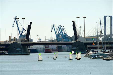 Sailing boats and Seville harbour on the river Rio Guadalquivir, Seville, Andalusia, Spain, Europe Stock Photo - Rights-Managed, Code: 841-02994169